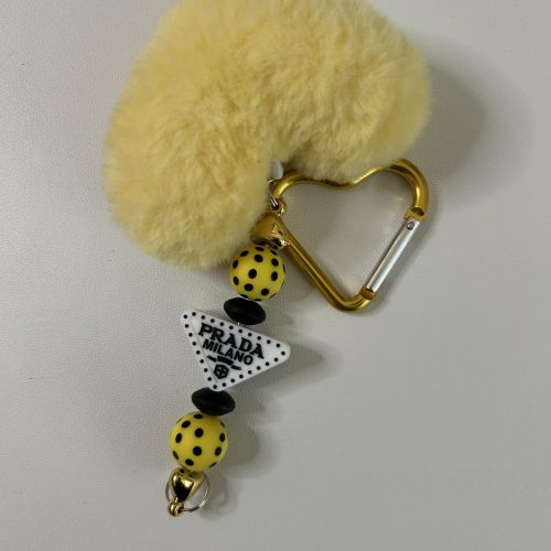 Bar Keychain White Prada with Yellow Heart Pom-Pom