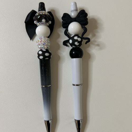 Two Fancy Black and White Bow Pens